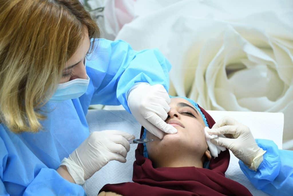 A woman is getting a facial treatment in Tijuana.